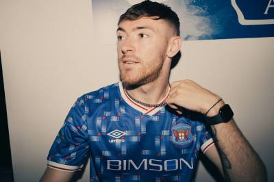 carlisle_united_2023_24_umbro_home_kit_b.jpeg