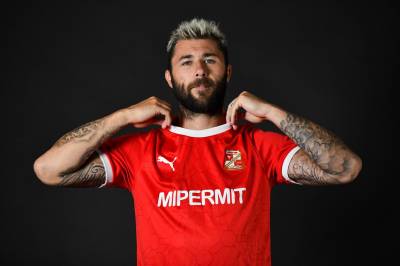 swindon_town_2023_24_puma_home_kit_a.jpeg