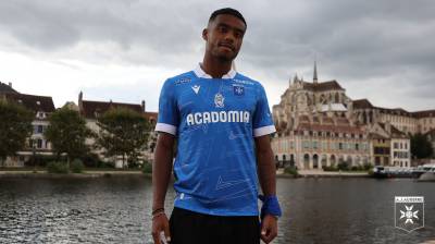 auxerre_2023_24_macron_third_kit_a.jpeg