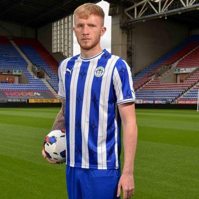 wigan_athletic_2023_24_puma_home_kit_c.jpeg