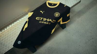 manchester_city_26_27_away_puma_kit_e.jpg